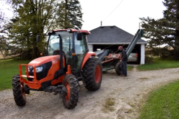 Al Rysavy works on tractor and corn harvester on Family Farm near Owatonna, MN, Saturday, Oct. 12-13, 2018. (Photo/Albert Rysavy)